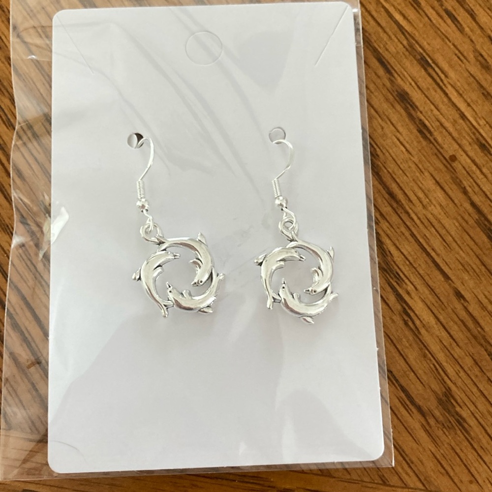 Sterling silver “ dolphin ”  earrings.